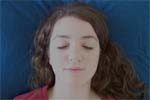 Reiki client's face with eyes closed.